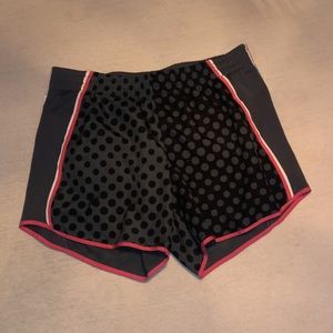 Grey and black nike shorts with pink details